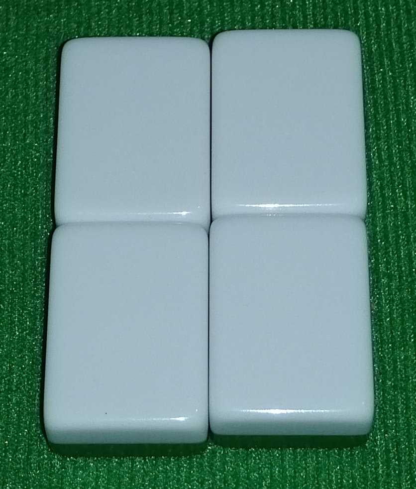 Four haku tiles to show that there are four of each tile.